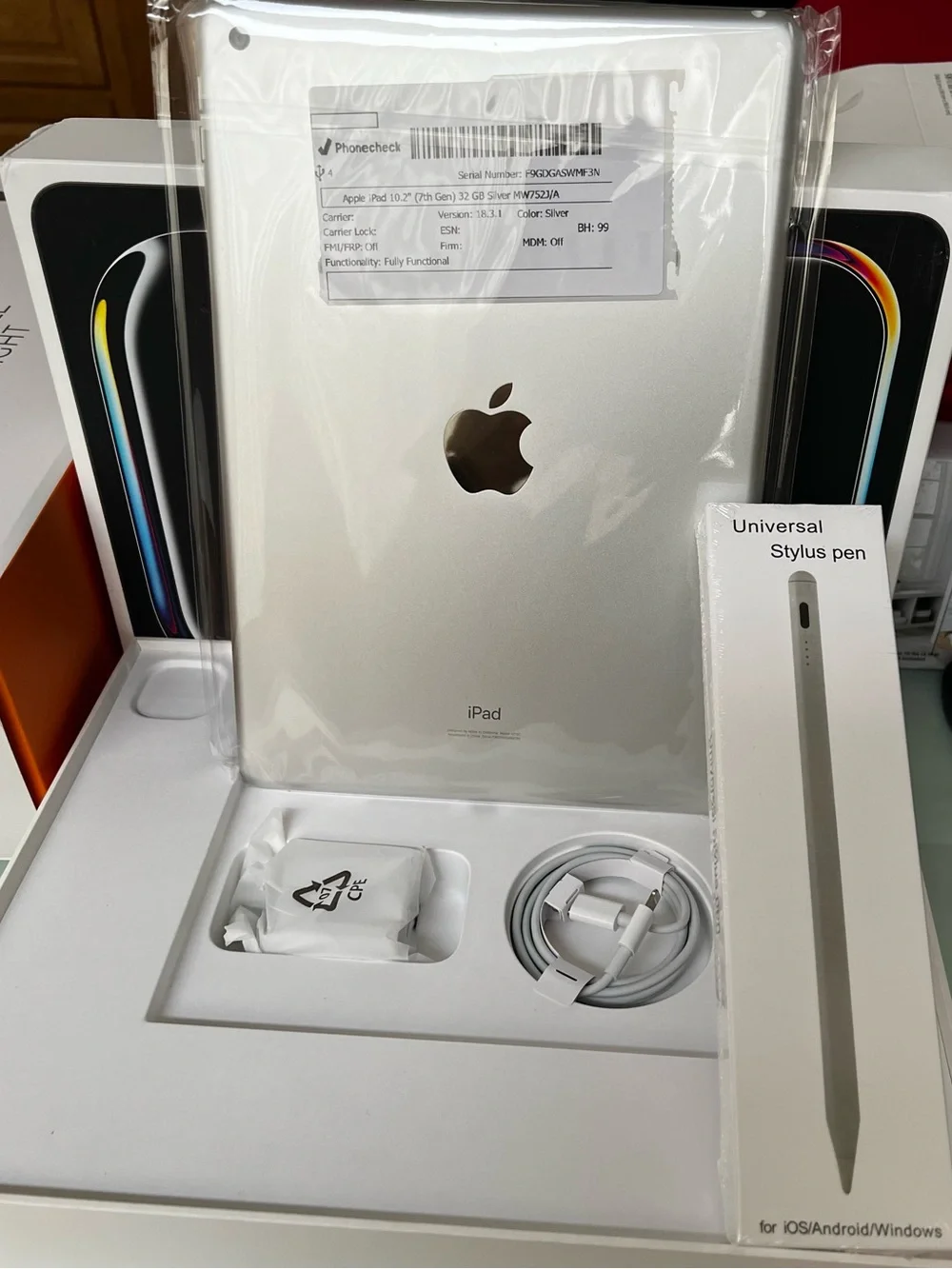 Apple iPad Silver Tablet with Included Cable